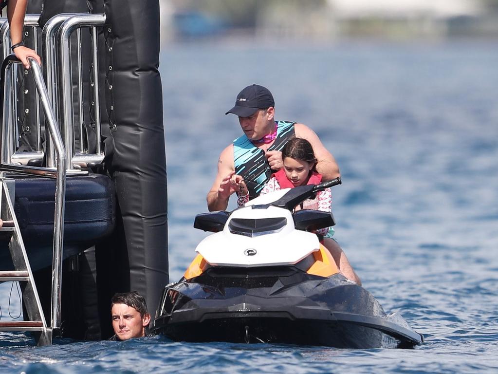 Karl Stefanovic and girlfriend Jasmine Yarbrough were spotted holidaying in Bora Bora with James Packer and his kids, aboard his luxury yacht Arctic P. They were also accompanied by a group of friends, including a mystery brunette, who is pictured sitting next to a visibly larger James Packer. Picture: Backgrid