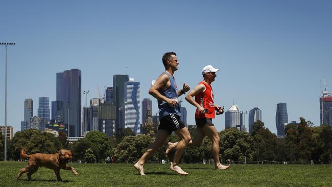 People enjoy the weather in Princes Park in Carlton, Melbourne after months of lockdown. Picture: NCA NewsWire / Daniel Pockett