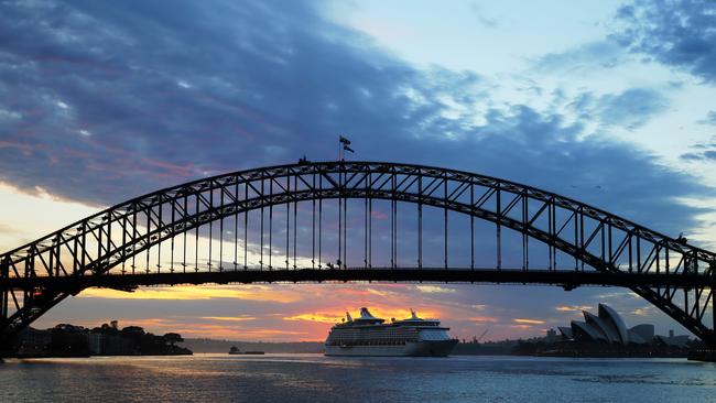 Sunrise over Sydney Harbour on another hot morning. Picture: John Grainger