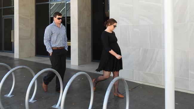 A heavily pregnant Marlee Veness leaving the Alice Springs Supreme Court with her partner