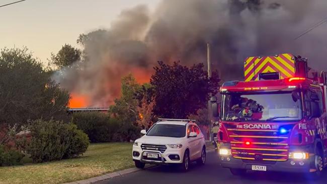 Police and emergency services were called to Raphael Ave, Dernancourt just before 8.30pm on Monday night to reports of a house fire and arrived to find the home engulfed in flames. Picture: Robin Gill Ripu/Facebook.