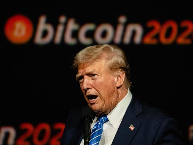 (FILES) Former President and 2024 Republican presidential candidate Donald Trump gives a keynote speech on the third day of the Bitcoin 2024 conference at Music City Center July 27, 2024 in Nashville, Tennessee. Trump's triumphant return to the White House signals a potential golden era for cryptocurrencies, whose influential backers heavily supported his presidential bid. After years of ascendancy following bitcoin's emergence, the cryptocurrency industry had fallen into a "crypto winter," plagued by scandals and hostile regulatory oversight. But Trump's impending presidency has spurred an enthusiastic market response, with bitcoin surging more than 25 percent in a week and breaking through the $90,000 mark for the first time. (Photo by Jon CHERRY / GETTY IMAGES NORTH AMERICA / AFP)