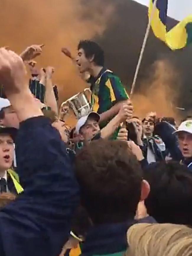 St Kevin's students set off flares at an APS athletics carnival. Picture: Supplied