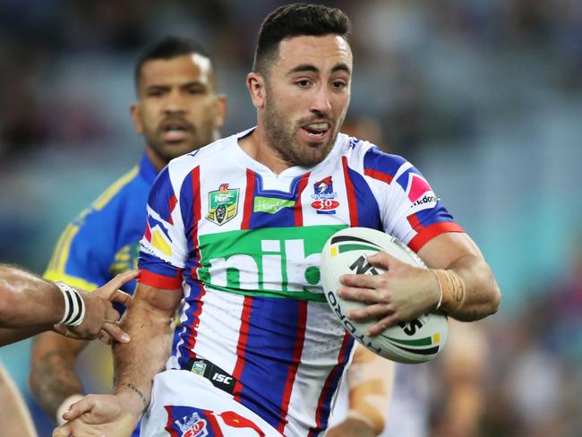 Newcastle's Brock Lamb makes a break to set up a try by Newcastle's Mitch Barnett during the Parramatta Eels v Newcastle Knights rugby league match at ANZ Stadium, Homebush. Picture: Brett Costello