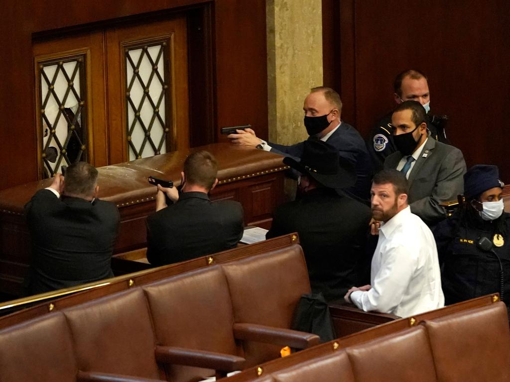 Politicians were evacuated before the group made it inside. Picture: AFP