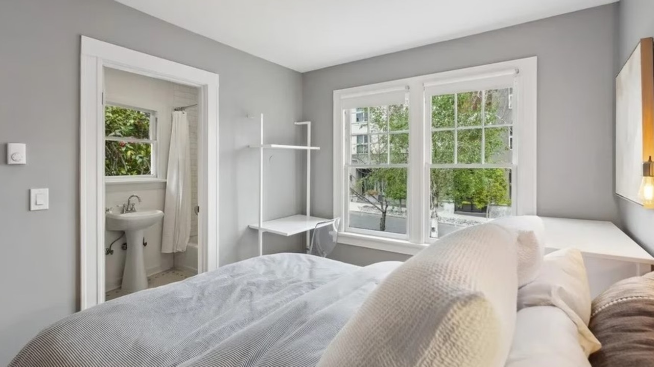 One of the two bedrooms in the property is open and airy — albeit with a pint-sized bathroom. Picture: Realtor