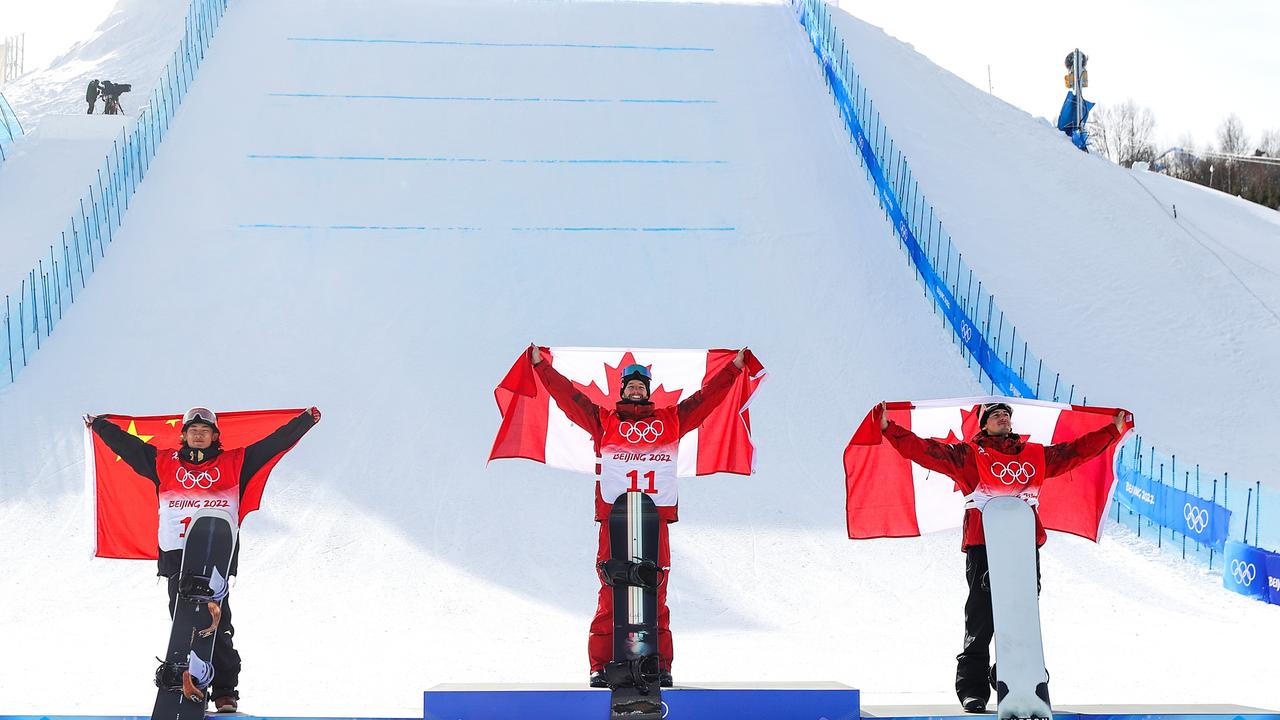 Gold medallist Max Parrot of Team Canada, Silver medallist Yiming Su of Team China and Bronze medallist Mark McMorris of Team Canada celebrate. Photo by Patrick Smith/Getty Images.