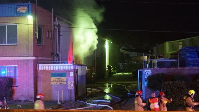 An onsite forklift and front-end loader were used to help break up a pile of recycling materials. Picture: Fire and Rescue NSW