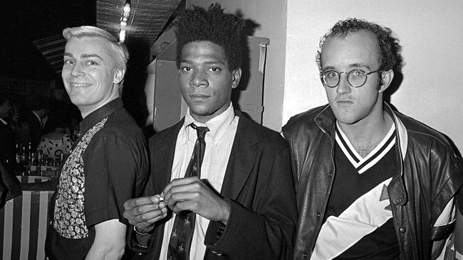 Jean-Michel Basquiat and Keith Haring (right) at AREA Club, New York, 1985 Photo: © Ben Buchanan