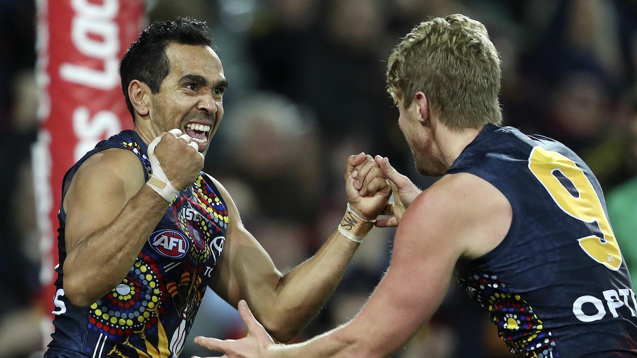 Eddie Betts celebrates a goal with Rory Sloane. Picture Sarah Reed