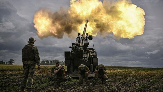 Ukrainian servicemen fire with a French self-propelled 155mm/52-calibre gun towards Russian positions at a front line in the eastern Ukrainian region of Donbas. Kyiv’s forces have been firing around 6,000 artillery shells a day. Picture: AFP