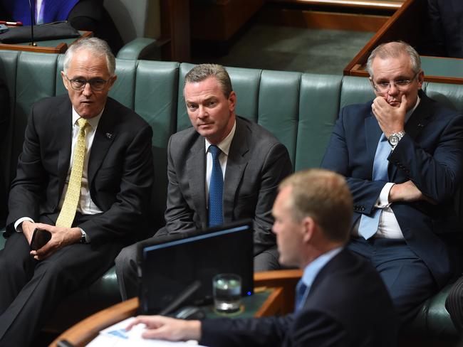 Prime Minister Malcolm Turnbull, Defence Industries Minister Christopher Pyne and Treasurer Scott Morrison look at Speaker Tony Smith after the government lost two divisions in the House of Representatives. Picture: AAP Image/Mick Tsikas