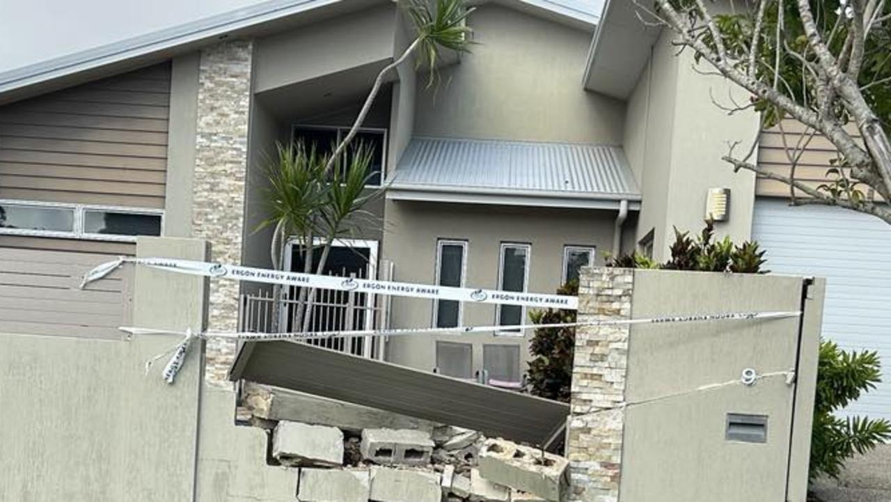 Car flips, crashes into two houses at up-market Qld estate