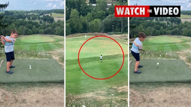 Amazing moment four-year-old hits hole in one