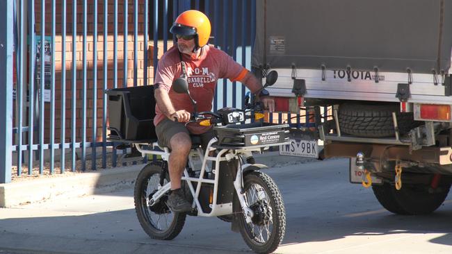 Current CLP MLA for Namatjira Bill Yan gets on his bike at the Living Waters Lutheran School voting centre on election day. Picture: Gera Kazakov