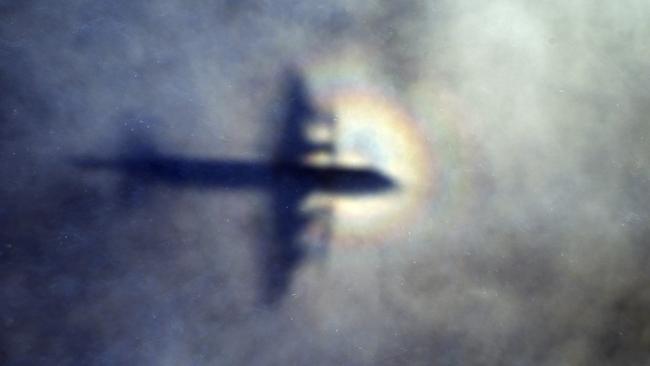 A family searching for debris of missing flight MH370 has discovered a part of the jet on a beach. Picture: Rob Griffith/AP