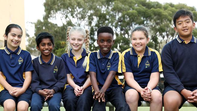 Pupils at Kingswood’s St Joseph's Public School: Asal Nematzadeh, 9, Pallav Giddaluri, 9, Cassidy Watson, 10, Edmond Williams, 8, Charli Hofmeier, 9, and Dreisson Nugroho, 11; the school has lifted its literacy results in NAPLAN thanks to dedicated instructional leaders Picture: Tim Hunter.