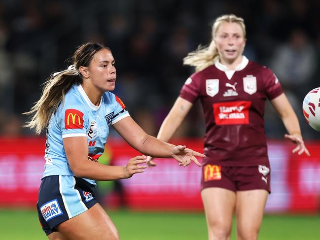 The Titans have risen from the ashes of 2022, landing more Origin stars than any other team ahead of the 2023 season, including NSW five-eighth Taliah Fuimaono (left). Picture: Getty Images.