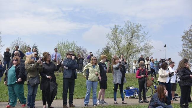 Prince mourners gather across the street from the singer’s home. Picture: Getty