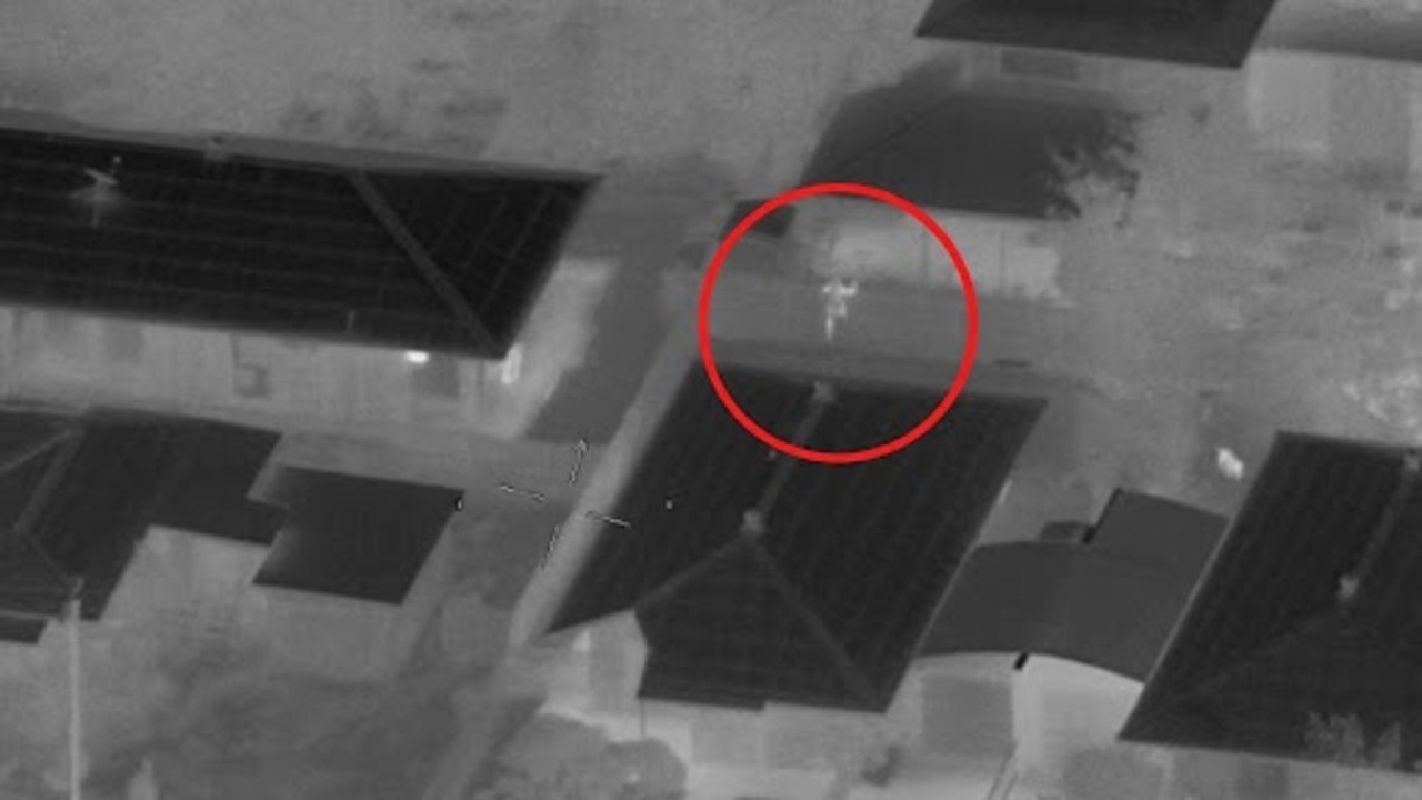 An alleged violent domestic abuser’s attempts to flee Townsville Police through a Townsville property were captured on film by the new police helicopter. Picture: Supplied