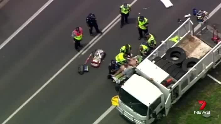 Man hit by truck on Cunningham Highway while changing tyre