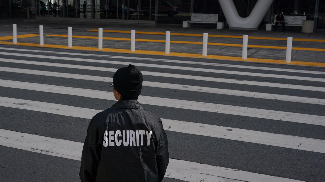 A security employee works at the Moscone Center ahead of the Asia-Pacific Economic Cooperation (APEC) meetings in San Francisco, California, on November 9. Picture: Loren Elliott / AFP