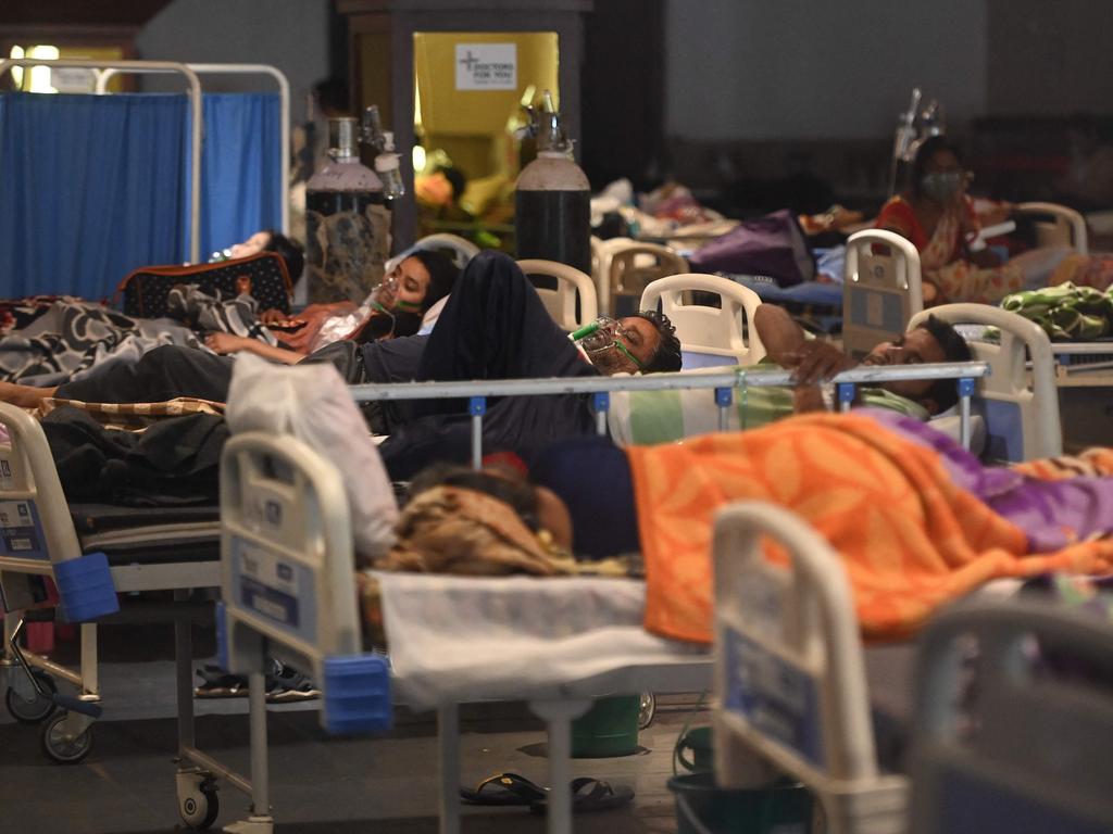 COVID-19 patients set up inside a banquet hall temporarily converted into a virus ward in New Delhi. Picture: Money Sharma/AFP