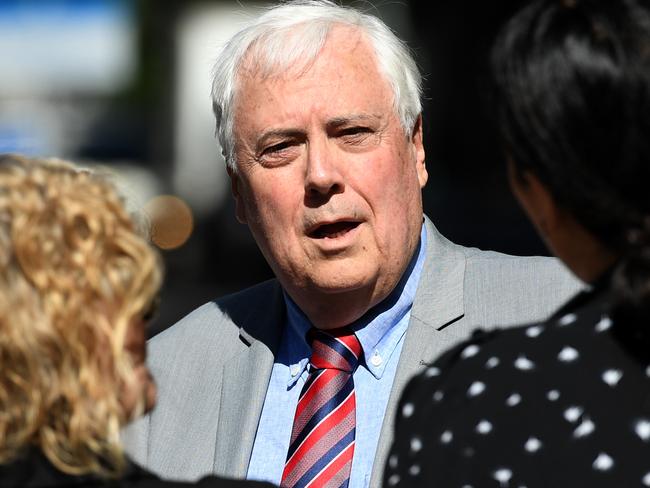 Former federal MP and businessman Clive Palmer talks to the media outside the Supreme Court in Brisbane, Thursday, September 7, 2017. A suite of lawsuits linked to Clive Palmer could be rolled into a single massive mega-trial unless the workload becomes too big to handle at once, a court has heard. (AAP Image/Dan Peled) NO ARCHIVING