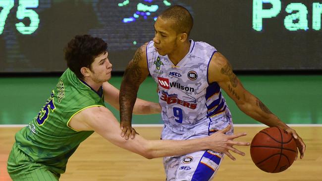 NBL Round 10 match between the Townsville Crocodiles and the Adelaide 36ers at 'The Swamp'. Crocodiles Clint Steindl and 36ers Jerome Randle. Picture: Wesley Monts