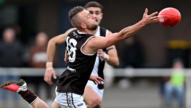 EDFL: Craigieburn’s Nathan Perrone can’t reach the ball. Picture: Andy Brownbill