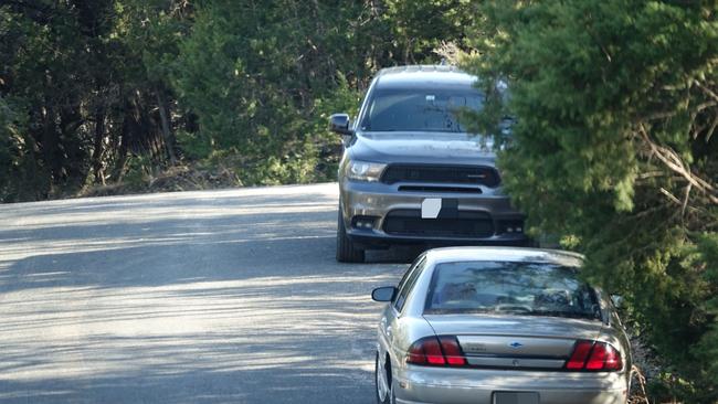 Guards are parked outside Joe Rogan’s home. Picture: Backgrid