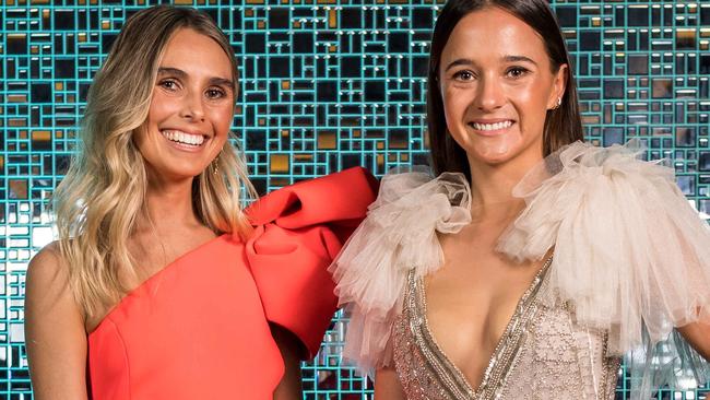 WAGS Hannah Davis (Tom Mitchell) and Olivia Burke (Tom Lynch) get ready for the Brownlow. Picture: Jake Nowakowski