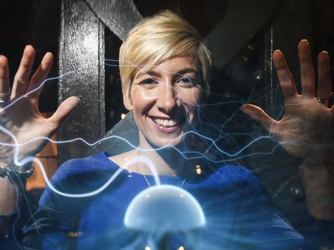 One Big Switch campaign on energy. Kirsty Lamont with her hands on a plasma ball (full of light, sparks and energy) at Powerhouse Museum. Picture: Dylan Robinson ** EMBARGO July 4th **
