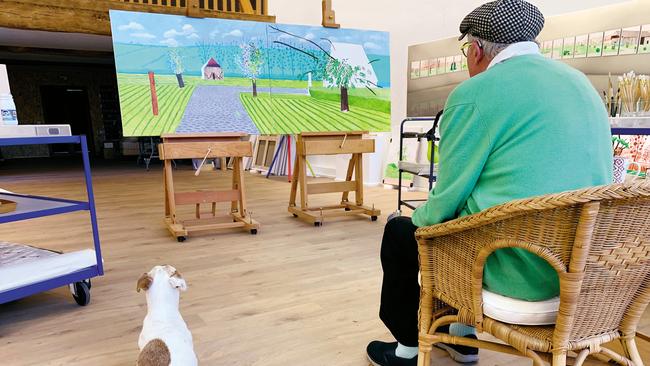 David Hockney and his dog Ruby in his Normandy studio. Picture: Jean-Pierre Gonsalves de Lima