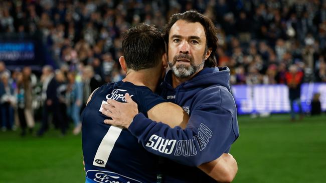 Geelong’s Shaun Mannagh and Chris Scott embrace after the Cats’ 14-point win over the Western Bulldogs. Picture: Michael Willson/AFL Photos via Getty Images.