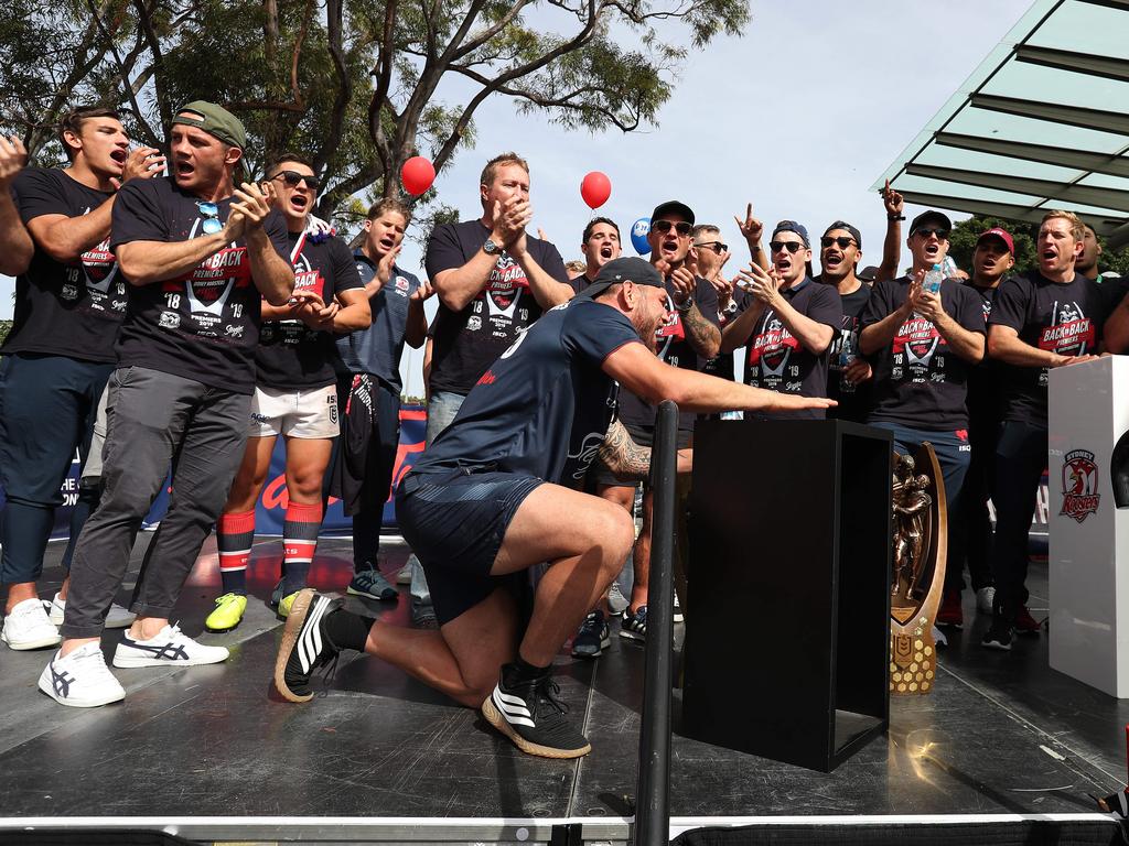 Roosters players sing the team song during the Sydney Roosters fan day outside the Hordern Pavilion, Sydney after the Roosters 2019 NRL Premiership win. Picture: Brett Costello