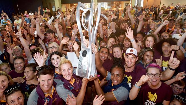 Brisbane Broncos players celebrate with their fans. NO ARCHIVING