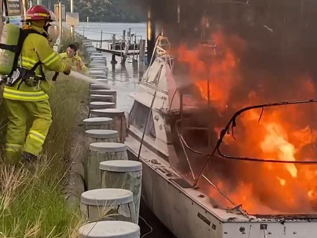 MUST CREDIT Pic: Greg Manning. Facebook video grab. Up to 8 people were  taken to hospital with burns when a 28 foot cruiser exploded into flames at Brooklyn Marina on the Hawkesbury River today. Source: MUST CREDIT Greg Manning. Facebook @ Greg Manning - https://www.facebook.com/greg.manning.792/videos/10220675966073589