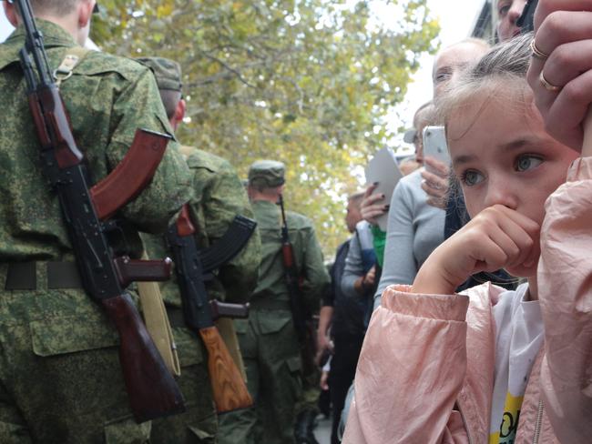 Families in Russian-annexed Crimea on Tuesday farewell reservists called up by Vladimir Putin’s partial mobilisation after his reversals in Ukraine. Picture: AFP