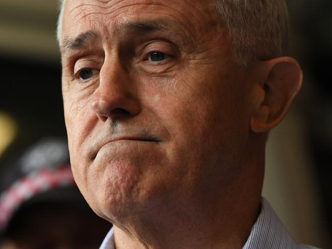 Australian Prime Minister Malcolm Turnbull addresses the media at the Cobden fire station in Victoria, Sunday, March 25, 2018. Mr Turnbull has visited Cobden to meet with locals and first responders following the devastating fire which tore through the area. (AAP Image/James Ross) NO ARCHIVING