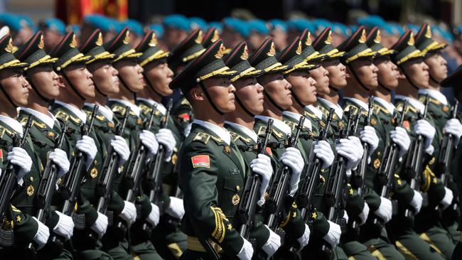 Soldiers from China's People's Liberation Army march in a military parade. Picture: AFP