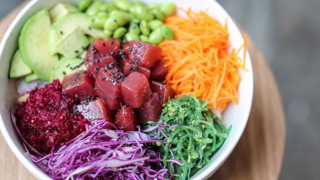 Poke Me’s diced salmon poke bowl.