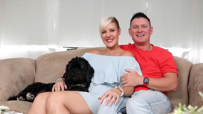 Kyla Thoms with her husband Jason Thoms and dog Leroy. Photo: Richard Gosling