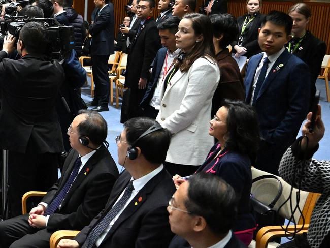 Australian journalist Cheng Lei (seated, centre R) observes a signing ceremony by China's Premier Li Qiang and Australia's Prime Minister Anthony Albanese at the Australian Parliament House in Canberra in Canberra. Picture: AFP