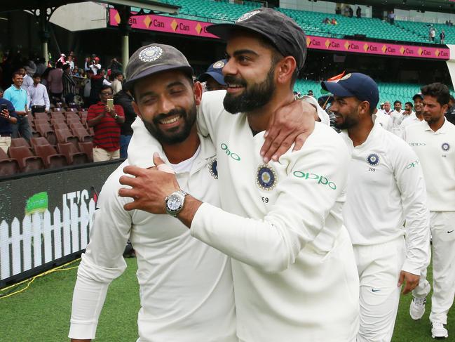 SYDNEY, AUSTRALIA - JANUARY 07: Ajinkya Rahane of India and Virat Kohli of India celebrate winning the series and the BorderGavaskar Trophy during day five of the Fourth Test match in the series between Australia and India at Sydney Cricket Ground on January 07, 2019 in Sydney, Australia. (Photo by Mark Evans/Getty Images)