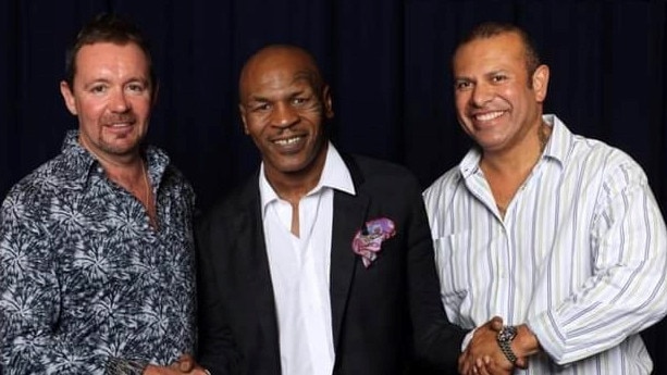 Richie Ahsam (right) with Hollywood Showgirls owner Craig Duffy and boxing legend Mike Tyson.