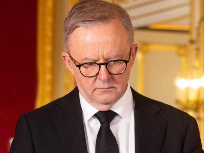 LONDON, ENGLAND - SEPTEMBER 17: Prime Minister of Australia, Anthony Albanese, and his partner Jodie Haydon sign a book of condolence at Lancaster House following the death of Queen Elizabeth II, on September 17, 2022 in London, England. (Photo by David Parry - WPA Pool/Getty Images)