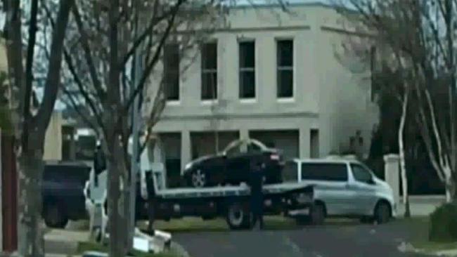 A black Mercedes has been photographed on a tow truck in the street of murdered woman Karen Ristevski. Picture: Channel 7