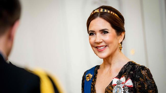 Queen Mary of Denmark smiles during a gala dinner. Picture: AFP