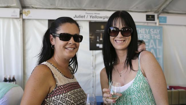 Mel Hawke and Katy Smith sampling the wines at the Capricorn Food & Wine Festival Photo Emily Szilveszter / Capricorn Coast Mirror